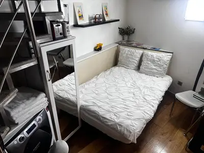 Un ou plusieurs lits dans un hébergement de l'établissement Studio Montmartre by HPN