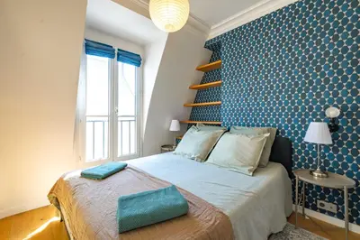 Un ou plusieurs lits dans un hébergement de l'établissement 6 Guest Flat - Martyrs