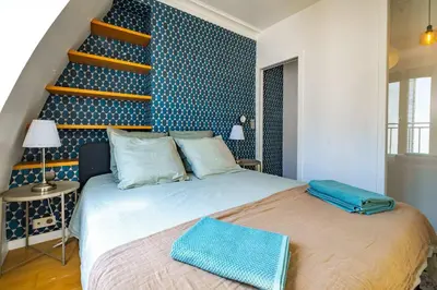 Un ou plusieurs lits dans un hébergement de l'établissement 6 Guest Flat - Martyrs