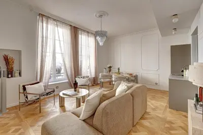 Coin salon dans l'établissement La suite de luxe Saint Germain