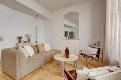 Coin salon dans l'établissement La suite de luxe Saint Germain
