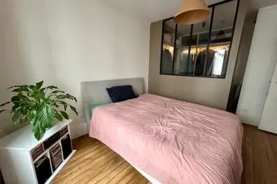 Un ou plusieurs lits dans un hébergement de l'établissement Charming 2 rooms for 2 in Paris