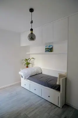 Un ou plusieurs lits dans un hébergement de l'établissement Cozy studio near Paris