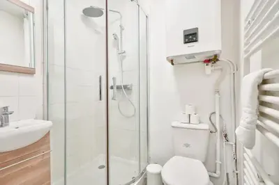Salle de bains dans l'établissement Cozy studio near Paris