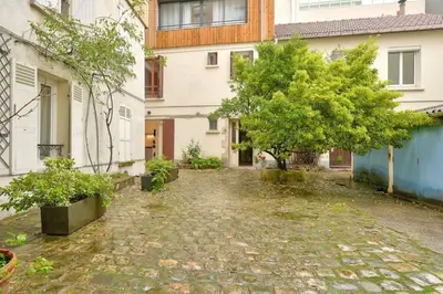 Jardin de l'établissement Cozy studio near Paris