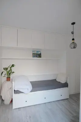 Un ou plusieurs lits dans un hébergement de l'établissement Cozy studio near Paris