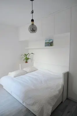 Un ou plusieurs lits dans un hébergement de l'établissement Cozy studio near Paris