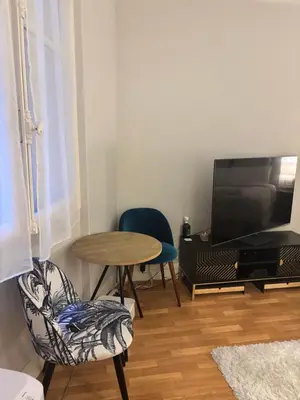 Télévision ou salle de divertissement dans l'établissement Studio Élégance