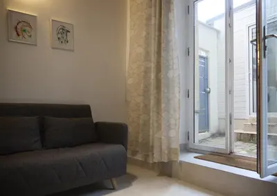 Coin salon dans l'établissement Studio jardin privé paris centre
