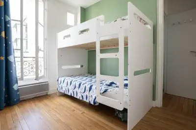 Un ou plusieurs lits dans un hébergement de l'établissement Dumoncel - KP - Chic and cozy apt in the 14th arrondissement