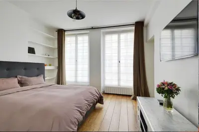 Un ou plusieurs lits dans un hébergement de l'établissement Luxury apartment in prestigious Le Marais - Top Location