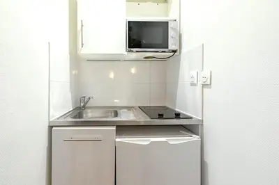 Cuisine ou kitchenette dans l'établissement Studio cool avec mezzanine 17ème arrondissement