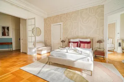 Un ou plusieurs lits dans un hébergement de l'établissement Charme et standing - 2 chambres proches Trocadéro