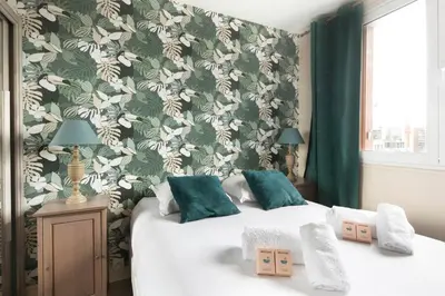 Un ou plusieurs lits dans un hébergement de l'établissement Gorgeous apartment Near Paris - 5P