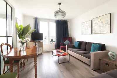 Coin salon dans l'établissement Gorgeous apartment Near Paris - 5P