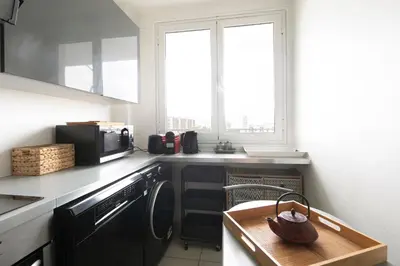 Cuisine ou kitchenette dans l'établissement Gorgeous apartment Near Paris - 5P