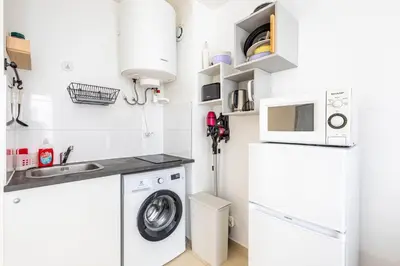 Cuisine ou kitchenette dans l'établissement GuestReady - Serene base two steps from Paris