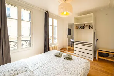 Un ou plusieurs lits dans un hébergement de l'établissement 6 Guests Flat - Montparnasse