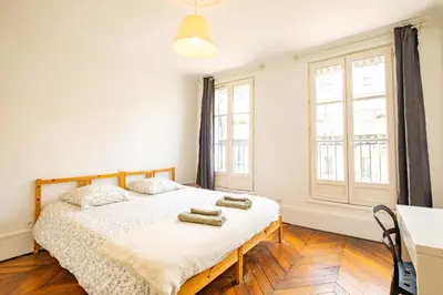 Un ou plusieurs lits dans un hébergement de l'établissement 6 Guests Flat - Montparnasse