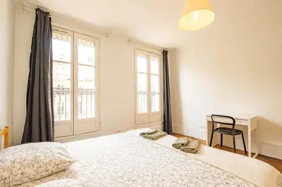 Un ou plusieurs lits dans un hébergement de l'établissement 6 Guests Flat - Montparnasse