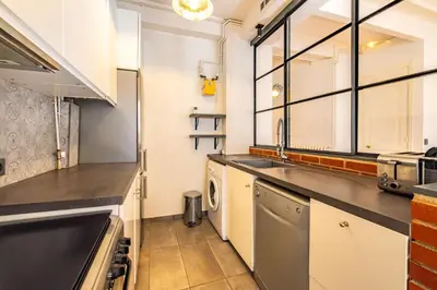 Cuisine ou kitchenette dans l'établissement 4 Guests Flat - Turbigo