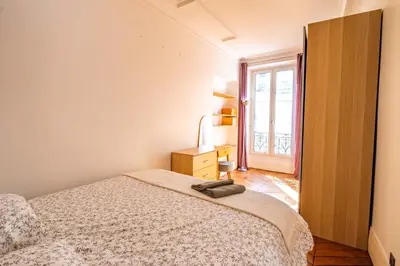 Un ou plusieurs lits dans un hébergement de l'établissement 4 Guests Flat - Turbigo