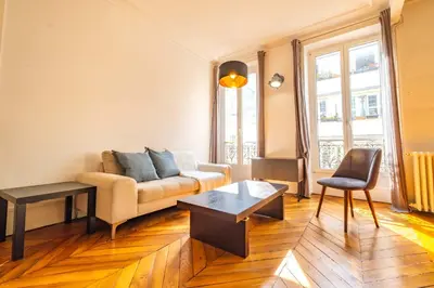 Coin salon dans l'établissement 4 Guests Flat - Turbigo