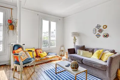 Coin salon dans l'établissement Charmant 70m2 pour 4 pers Rue de Crussol Paris