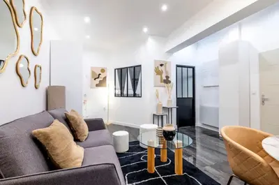 Coin salon dans l'établissement Keyz - Central 1 Bedroom near the Picasso Museum