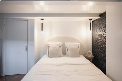 Un ou plusieurs lits dans un hébergement de l'établissement Modern apartment in Nation