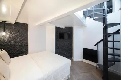 Un ou plusieurs lits dans un hébergement de l'établissement Modern apartment in Nation