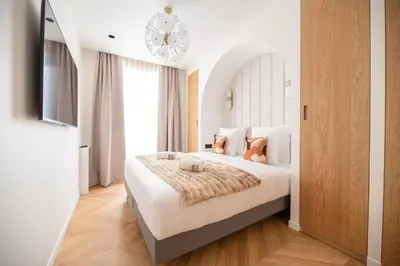 Un ou plusieurs lits dans un hébergement de l'établissement Stylish Flat in Paris' Center