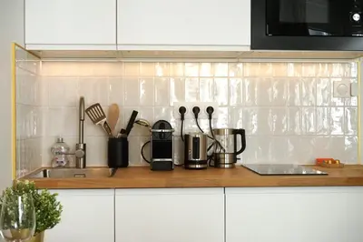 Cuisine ou kitchenette dans l'établissement Pop Appart - Expo Paris Porte de Versailles - Balcon - Climatisation - Parking