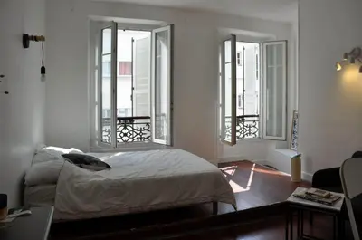 Un ou plusieurs lits dans un hébergement de l'établissement Appartement Buttes Chaumont