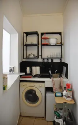 Cuisine ou kitchenette dans l'établissement Appartement Buttes Chaumont