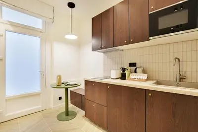Cuisine ou kitchenette dans l'établissement PARIS 11 - Magnifique suite L020