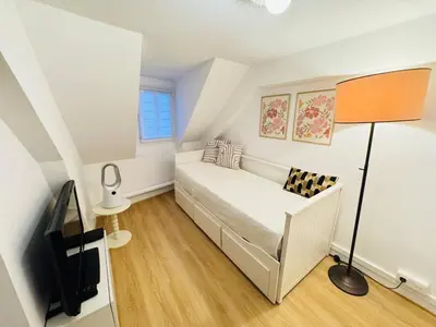 Un ou plusieurs lits dans un hébergement de l'établissement Cozy Studio - Paris Galeries Lafayette