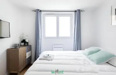 Un ou plusieurs lits dans un hébergement de l'établissement Charminng & cosy T2 for two in Paris 13th