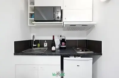 Cuisine ou kitchenette dans l'établissement Charminng & cosy T2 for two in Paris 13th