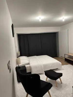 Un ou plusieurs lits dans un hébergement de l'établissement Cosy Parisian Upscale Apartment
