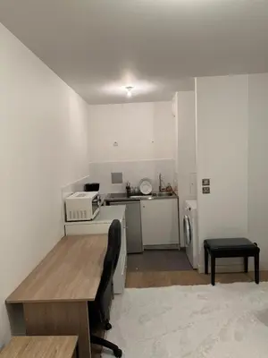 Cuisine ou kitchenette dans l'établissement Cosy Parisian Upscale Apartment