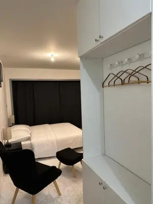 Un ou plusieurs lits dans un hébergement de l'établissement Cosy Parisian Upscale Apartment