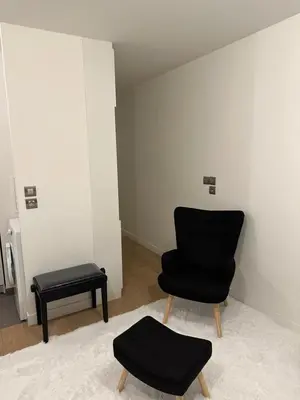 Coin salon dans l'établissement Cosy Parisian Upscale Apartment
