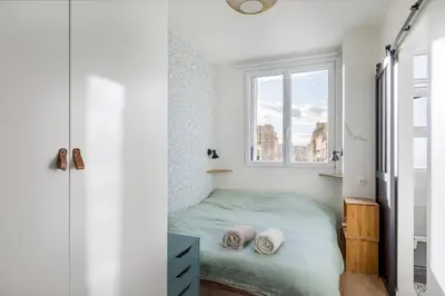 Un ou plusieurs lits dans un hébergement de l'établissement Chez Ferdi, agréable et confortable appartement, Paris, Boulogne, proche Parc des Princes