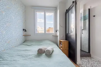 Un ou plusieurs lits dans un hébergement de l'établissement Chez Ferdi, agréable et confortable appartement, Paris, Boulogne, proche Parc des Princes