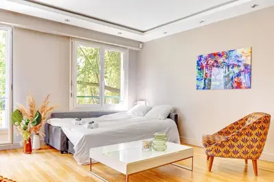 Un ou plusieurs lits dans un hébergement de l'établissement Appartement chic 82m2 6 pers Paris 16E