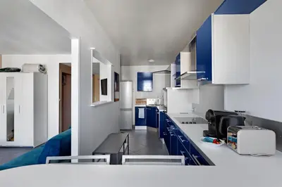 Cuisine ou kitchenette dans l'établissement BM-Confort & Calme 5 pers Rue des Mariniers