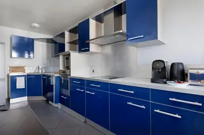 Cuisine ou kitchenette dans l'établissement BM-Confort & Calme 5 pers Rue des Mariniers