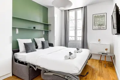 Télévision ou salle de divertissement dans l'établissement BM Rue Charlot Studio compact & chic pour 2