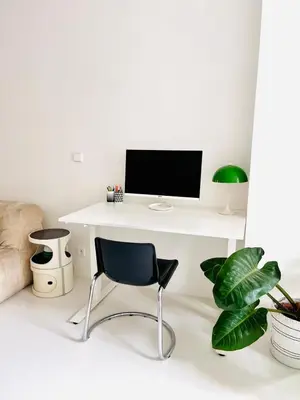 Télévision ou salle de divertissement dans l'établissement Design & cool appartement